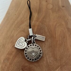 Coach - beautiful phone charm. Like new condition. Gems are intact.